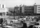 View: u10252 Construction of Charter Square looking towards Furnival Gate and showing (right) Pauldens Ltd., department store