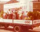 Children from Maud Maxfield School for the Deaf on a float in an unidentified parade 