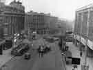 View: u10337 High Street looking down towards the Hole in the Road / Castle Square with John Walsh Ltd (right)