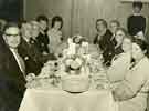 Dinner for employees of James Neill and Co (Sheffield) Ltd, showing Joyce and Charles Bradbury (far end of table on the right)