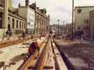Construction of Supertram stop on Commercial Street showing (top right) No. 14 Barclays Bank and (top centre) Gas Company offices