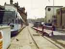 Construction of Supertram stop on Commercial Street showing (top right) No. 14 Barclays Bank and (centre) Park Square Supertram bridge