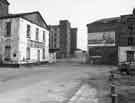 Polar Self Drive building (later demolished) and behind it the Straddle Warehouse, Canal Basin.