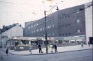 View: w02200 High Street showing (left) No.58 Central Dairy Products Ltd., and (right) J. Walsh and Co., department store
