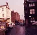 View: w02203 Tudor Way looking towards Sycamore Street, from Tudor Street. showing (left) No. 13 the Adelphi Hotel and (right) No. 21 House Refuse Collection and Disposal Department