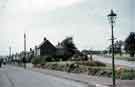 Watt Lane garden, Crosspool showing (right) junction with Dransfield Road