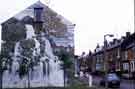 Waterfall mural by brothers Ben and Tristram on the gable end of No. 48 Holland Road viewed from Alsine Road