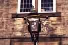 View: w02436 Lamp and carved stonework above entrance to Plough Inn, No. 288 Sandygate Road, Crosspool 