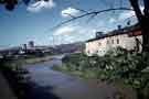 View of the River Don from Hillfoot Bridge looking upstream showing (right) Andrews Toledo Ltd., Toledo Steel Works, Neepsend Lane, Neepsend and (left) Neepsend Power Station