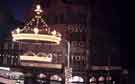 View: w02762 Christmas decorations on Haymarket showing Arthur Davy and Sons Ltd., provision merchants