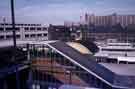 View: w02786 View from Arundel Gate across Pond Street bus station towards (right) Park Hill Flats showing (foreground) a covered escalator to Pond Street and (left) Royal Mail sorting office, Pond Hill