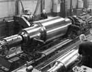 Thos. Firth and John Brown Ltd. - finish grinding a 56” x 91” back-up roll made as a one-piece forging