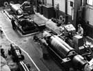 Thos. Firth and John Brown Ltd. - general view of Firth Brown roll grinding shop. Large rolls 35 x 96 (weight 16 tons each) - for hot rolling aluminium, in process of grinding