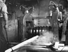 Thos. Firth and John Brown Ltd. - Cogging mill for producing bars and billets in stainless steel - showing forged steel rolls in use. 