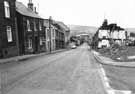 Burgoyne Road, Walkley (the parked car is outside a building with arched windows which was  Burgoyne Road School)