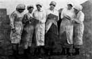Women workers at Thomas Firth and Sons Ltd., captioned 'Seen this month's Bombshell?' Women workers at Thomas Firth and Sons Ltd., captioned 'Seen this month's Bombshell?'