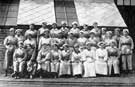 National Projectile Factory, Thomas Firth and Sons, Ltd., Norfolk Works, Sheffield. Bond Room Girls, who undertake the final handling and measuring of shells, just prior to their departure to the Filling Factories.