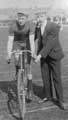 Cyclist Wildsmith and assistant on a grass track (2 of 6)