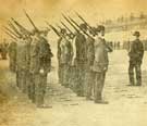 Members of Sheffield City Battalion being instructed on carrying of the rifle