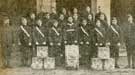 Group of members of the Sheffield Battalion with the new drums in front of the pavilion, Norfolk Park [City Battalion]