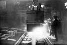 Thomas Firth and Sons Ltd: Siemens-Martin Furnace - pouring the molten steel into the moulds for projectile ingots