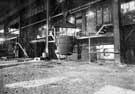 Washington Steel and Ordnance Co., Washington, USA: furnaces - running molten steel into a ladle