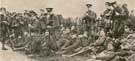 Route march by the 2/4th York and Lancaster Regiment (Hallamshire Regiment). A group of some of the men, snapped during a halt by the roadside.
