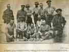 A cheerful group of Sheffield soldiers, with one or two luxuries they have managed to obtain [probably in Egypt]