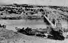 Colenso Bridge. Destroyed by the Boers and temporary structure erected by the Royal Engineers. Photograph by Sergeant Ellis of Volunteer Engineers. 