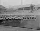 Visit of Queen Elizabeth and HRH the Duke of Edinburgh to Hillsborough football ground to see the children's display during their visit of 27th October 1954.