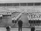 Visit of Queen Elizabeth and HRH the Duke of Edinburgh to Hillsborough football ground to see the children's display during their visit of 27th October 1954.