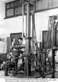 Harry Fletcher operating a vacuum pump on the prototype six-inch furnace at William Jessop and Son Ltd's Whiston Grange Research Centre, c. 1955