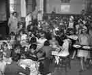 School meals; children taking dinner in a school hall School meals; children taking dinner in a school hall