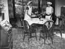 School meals; tables being prepared for dinner at a combined domestic subjects centre School meals; tables being prepared for dinner at a combined domestic subjects centre