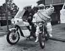 South Yorkshire Police: Constable David Burgum, Force motor cycle instructor, with 'friend' (Michelin Man) at the Roadcraft/Road Safety display - BIKEX '77 South Yorkshire Police: Constable David Burgum, Force motor cycle instructor, with 'friend' (Michelin Man) at the Roadcraft/Road Safety display - BIKEX '77