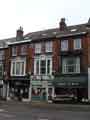 Shops at Fulwood Road, Broomhill showing (l. to r.) No. 275 SM Hair, hairdressers, No. 277 Sheffield Late Night Pharmacy and No. 279 Fruit A Peel, fruiterer