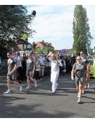 Olympic torch passing through Ecclesfield: John Burkhill outside Ecclesfield School