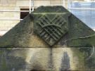 Carving of  Sheaf of Arrows at  the entrance of the former Broomgrove Bowling Green, Broomgrove Road.