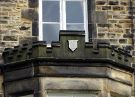 Castellated decoration on bay window of No 34 Victoria Street