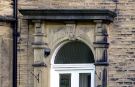 Decorative stone over front door of No.8 Tapton House Road 