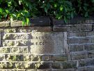 Mackenzie Crescent showing old stone street name, off Collegiate Crescent