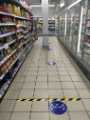 View: a05819 Covid-19 pandemic: Tesco Supermarket, Eyre Lane - social distancing floor markings