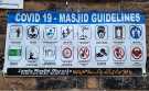 Covid-19 pandemic: sign outside Jamia Mosque Ghausia, Firth Park Road
