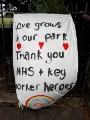 View: a06418 Covid-19 pandemic: Banner in Graves Park: Love grows in our park. Thank you NHS and key worker heroes.