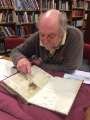 View: a06502 Rony Robinson researching at Sheffield City Archives