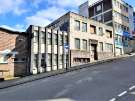 Derelict building on Lee Croft showing (left) Central Elim Pentecostal Church and (right) Mace Store, convenience shop, No. 66 Campo Lane