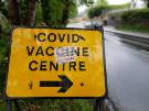Covid-19 pandemic: sign for Covid Vaccine Centre, Dore Road, Dore