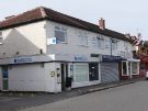Shops on Meadowhead showing No. 360 Barclays Bank, No.358 Meadowhead Meats, butchers and No. 356 Fairways Property Management, estate agents