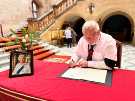 View: a07490 Council Leader, Councillor Terry Fox, signing the book of condolence for Queen Elizabeth II