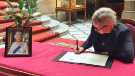 View: a07491 Council Chief Executive, Kate Josephs, signing the book of condolence for Queen Elizabeth II